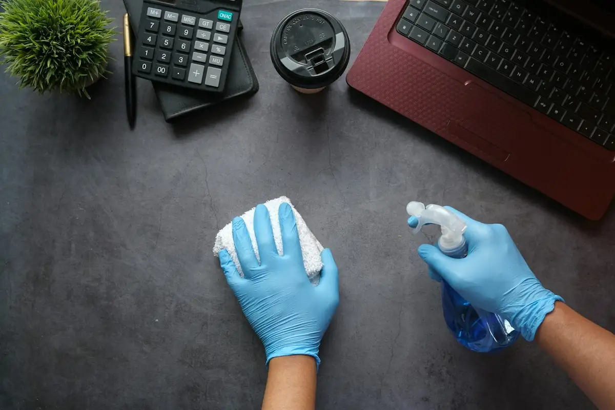 cleaning-with-spray-bottle.webp
